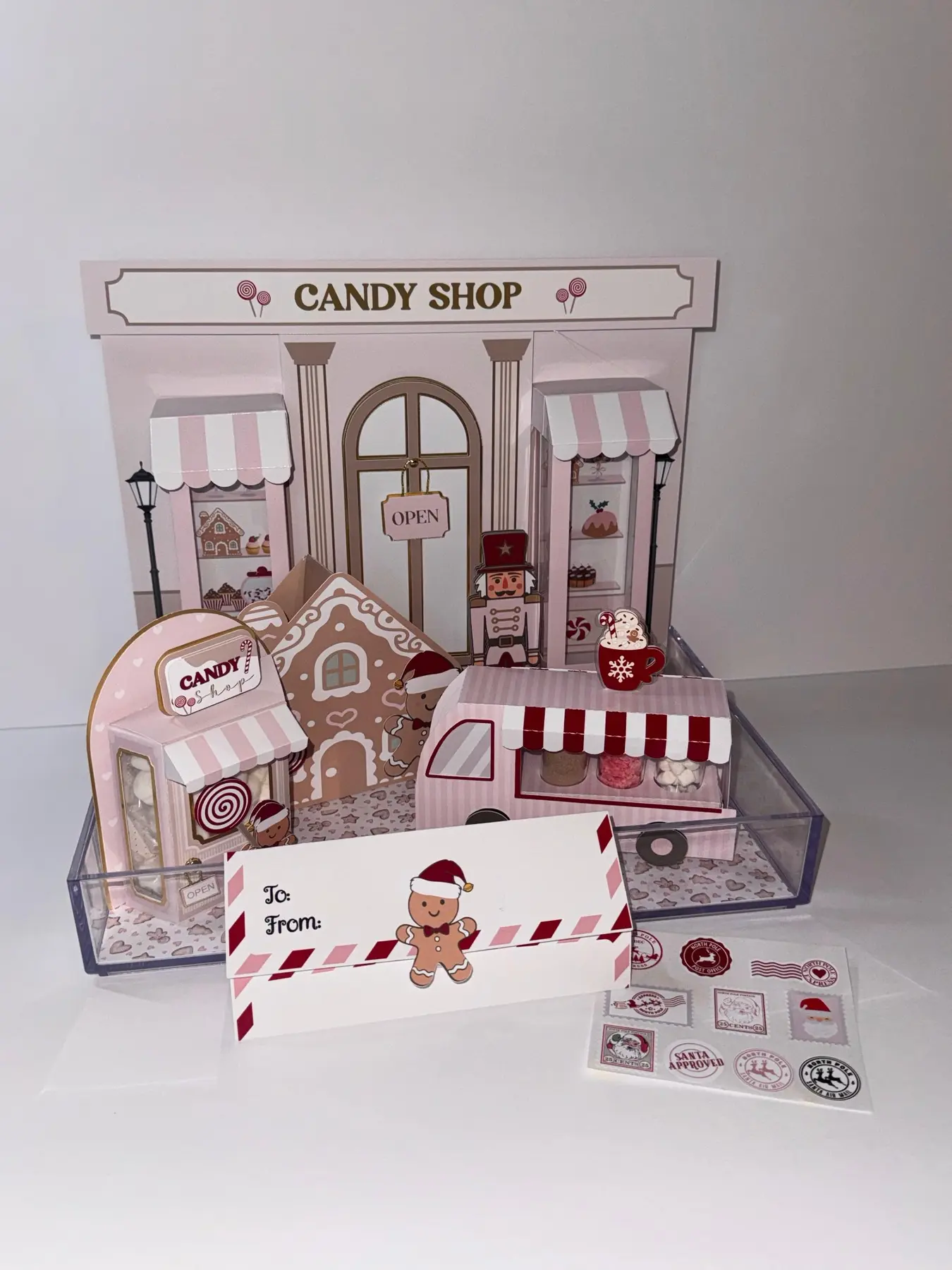 Colección navideña personalizada con candy shop, empaques y papelería coordinada
